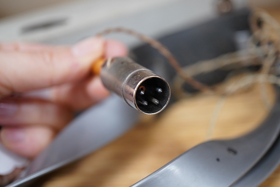 A late 1950s portable 9v battery powered reel-to-reel FI-Cord 1A, ‘Fidelity Recording’, as used by BBC reporters, with original vinyl strap and earphone